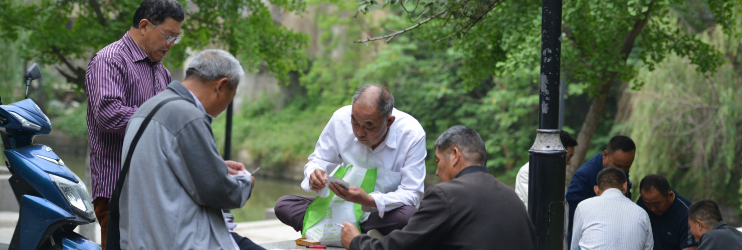 Old people sit together for entertainment and chat in Fuyang, China